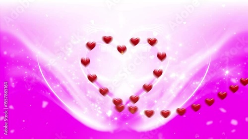 Valentine's Day animation features a series of red hearts rotating in a heart shape against a vibrant pink and white background. Sparkling effects, flowing light patterns, romantic dreamy atmosphere.