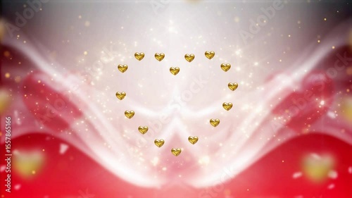 Valentine's Day animation features a mesmerizing display of gold hearts rotating in a heart shape with zoom-in effect against a dreamy background. Soft red and white hues, sparkling light effects.