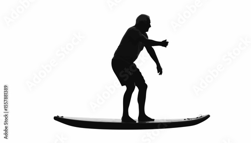 Elderly man balancing on windsurf board in silhouette, black and white, dynamic energy and adventure concept, watersports and outdoor activities.