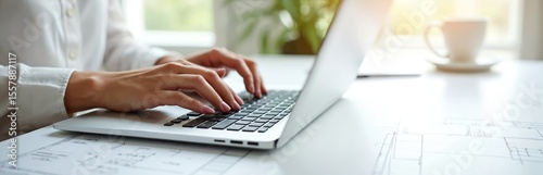 Woman typing on laptop keyboard closeup. Lady works online, learns remotely, uses internet marketing, works from home, office workplace freelance concept. Businesswoman student at workplace with cup