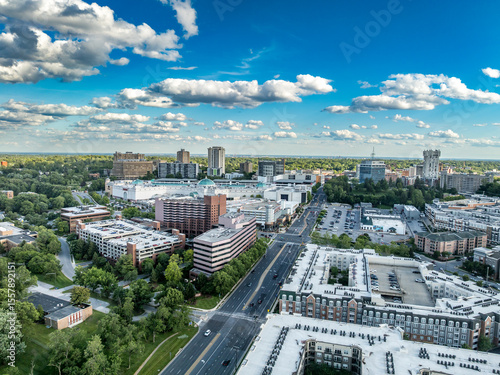 Aerial View: Towson Town Center, a prominent retail and lifestyle hub in Towson, Maryland with cloudy blue sky