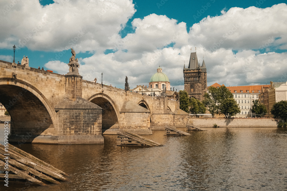 Obraz premium Boat Tour on Vltava river under Charles Bridge, Prague. Praha, old european city