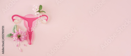 uterus and pink flowers, female reproductive system , woman health, PCOS, gynecologic and cervix cancer concept

