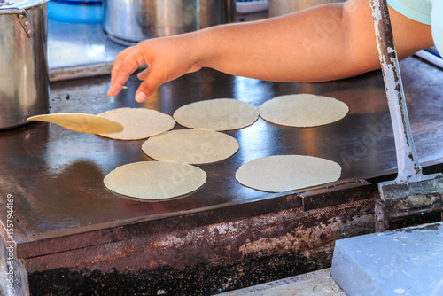 Tortillas being fried. Mexico, Nayarit State, Bucerias.