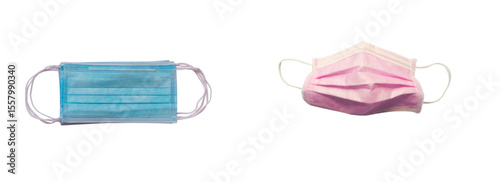 Two disposable face masks, blue and pink, isolated on white background
