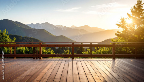 Modern balcony with wooden floor, mountain view, and sunrise light