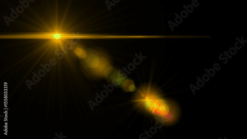 Bright golden lens flare light effect star burst shine glow radiance beam rays twinkle sparkle glitter dark background