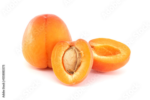 Fresh Ripe Apricots Whole and Sliced on a White Background
