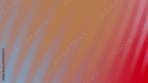 Abstract gradient background featuring soft waves of orange, red, and blue colors blending smoothly