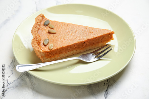 Plate with piece of tasty p...