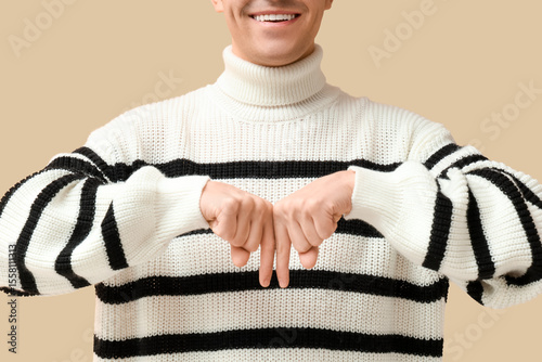 Young deaf mute man using s...