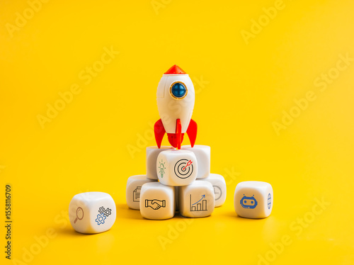 Business growth, startup, leadership, digital marketing, innovation technology, goal and success concept. Rocket ship with business strategy icons on cube blocks, isolated on yellow background.