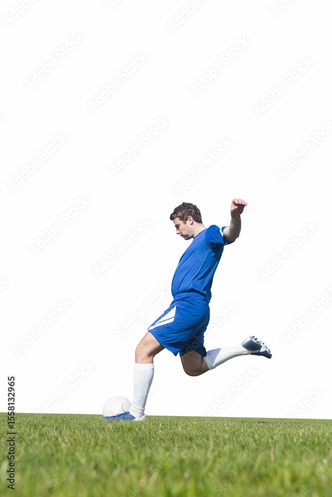 Football player kicking ball Football player kicking ball