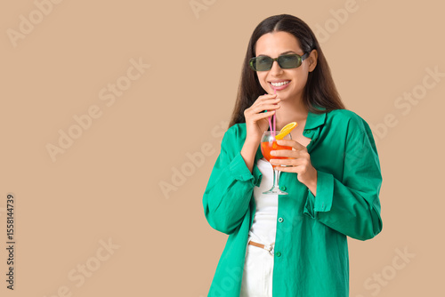 Young woman in sunglasses w...
