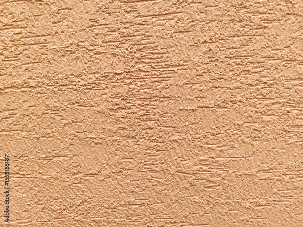 Fototapeta premium This is a wall with a rough texture.