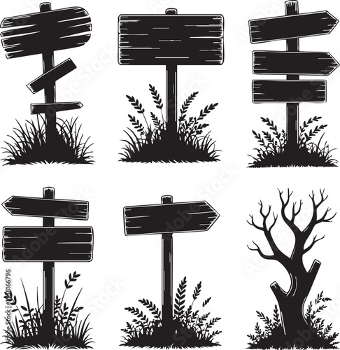 Wooden signs and bare tree silhouettes direction post