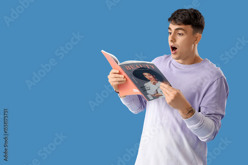 Surprised young man reading...