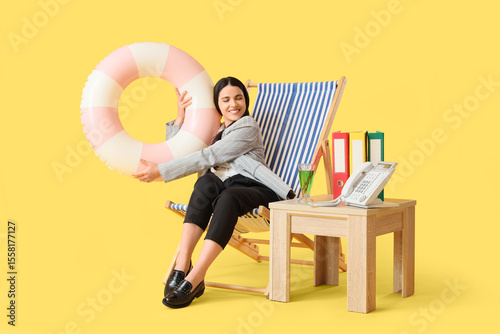 Businesswoman relaxing in b...