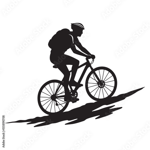 Silhouette of a cyclist riding uphill on a mountain bike with backpack and helmet