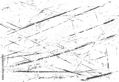 Charcoal scratch texture with intersecting grunge lines on white backdrop. Worn and industrial surface effect.