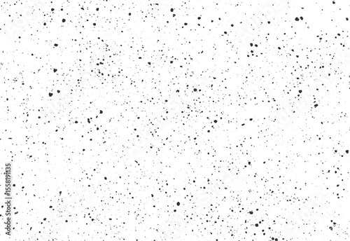 Grunge ink splatter texture background. Seamless vector pattern with scattered black droplets on white.