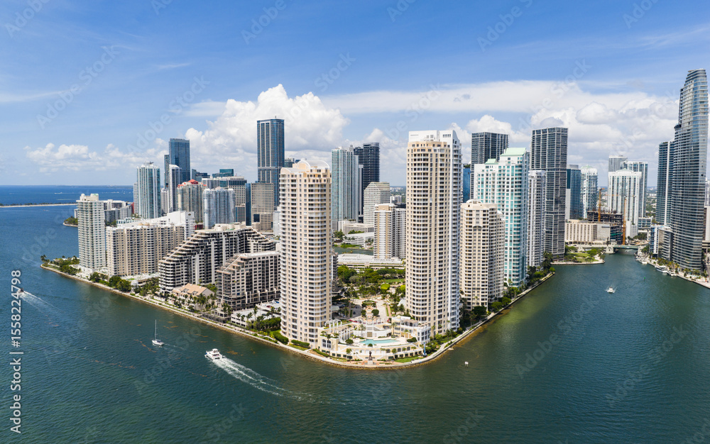 Obraz premium Drone view of Brickell skyscrapers. Brickell cityscape of downtown Miami. Panoramic Miami Brickell skyline above the coastline. Brickell Key aerial view in Miami. Landscape of Miami.