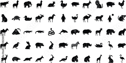 Collection of various animal silhouettes in white on a black background