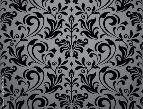 Wallpaper in the style of Baroque. Gray and black floral ornament. Seamless vector background. Graphic pattern for fabric, wallpaper, packaging. Ornate Damask flower illustration