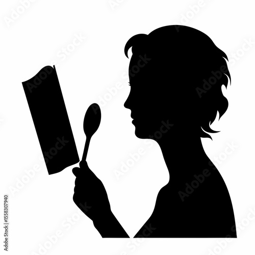 Silhouette of a woman reading a book while holding a spoon in her hand against white background