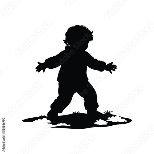 Silhouette of a young child exploring nature with outstretched arms