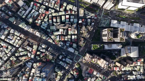 Top-Down Drone View of Taipei Urban Street Grid and Riverside Track