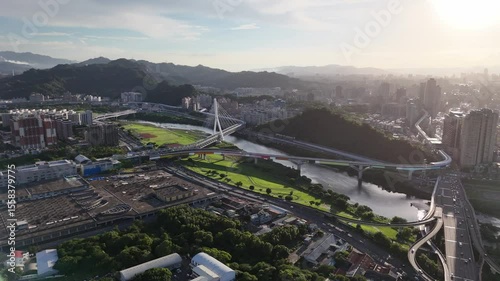 Cable-Stayed Bridge and Colorful Elevated Expressway Over Taipei Riverside Park