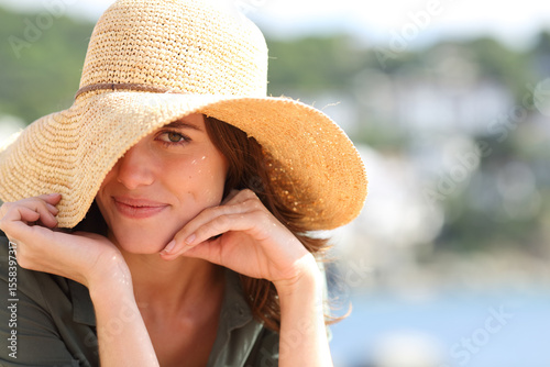 Portrait of a woman wearing pamela hat in summer