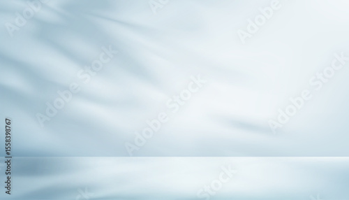 Blue background,Studio shot with shadow, light for product design,Vector interior room with branches leaves shadow, blurry abstract light effect overlay on blue wall background for Winter sale banner