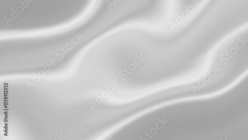 Abstract white satin fabric with soft elegant curves and subtle shading creates a gentle flowing luxurious texture