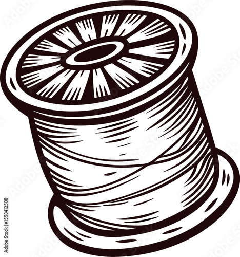 Hand drawn spool of thread in vintage engraving isolated on white background
