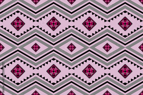 Ethnic abstract ikat art .Geometric ethnic seamless pattern  design for carpet,curtain,clothing,fabric,wrapping paper,tiles,textiles,batik,texture and wallpaper.Vector background.