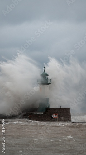 Storm in Sassnitz: Waves Crashing Against Lighthous