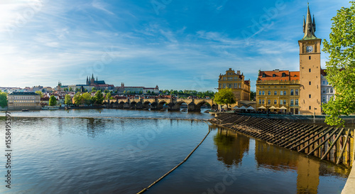 A panorama view along the east bank towards the Charles bridge in Prague in springtime