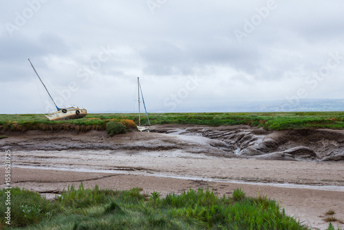 Canvastavla Abandoned vessel – a lonely boat marooned in a desolate tidal estuary
