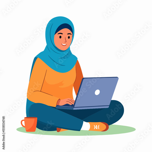 Woman in hijab sits crosslegged with a laptop She wears a blue headscarf and orange top A mug is beside her