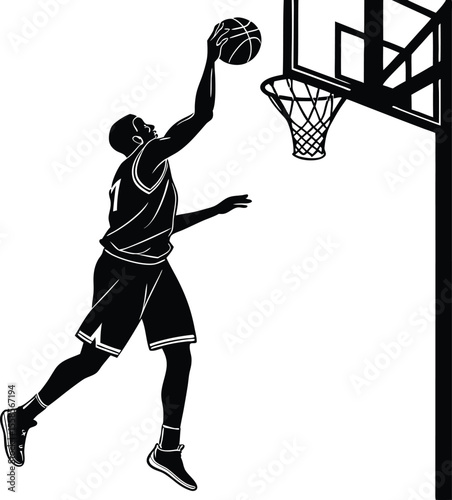Silhouette of a basketball player performing a slam dunk at the hoop