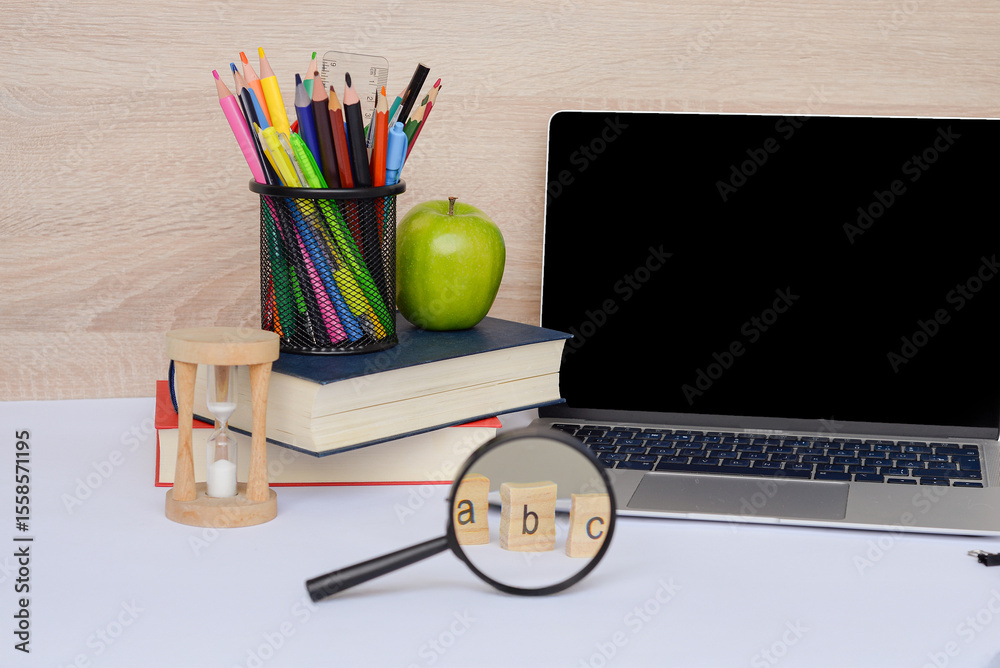 Naklejka premium Study Essentials for Success Including Laptop, Books, and Various Supplies for Effective Learning