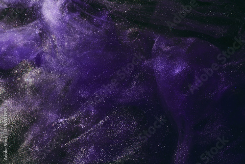 Abstract colorful background. Moving flow of purple paints, fluid liquid art, space sky