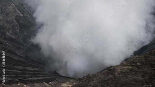 Bromo volcano crater caldera timelapse hot steam escapes Java island Indonesia nature