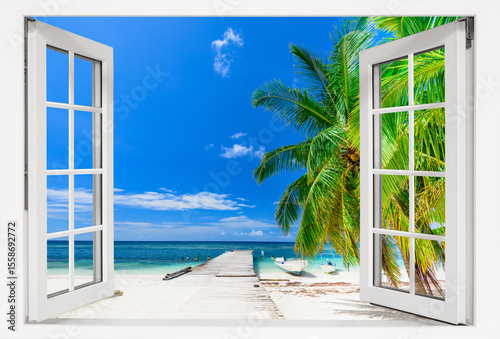 Window with a view of the ocean and a beach