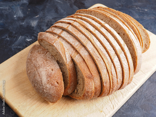 Tasty organic rye bread on a wooden cutting board