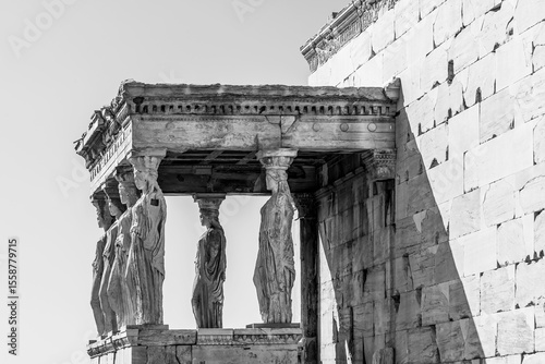 Black and white view of the ancient portico of the caryatids in the Erechtheion on the Acropolis of Athens, Greece