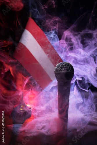 Photography Microphone on a background of a blurry flag of Austria close-up