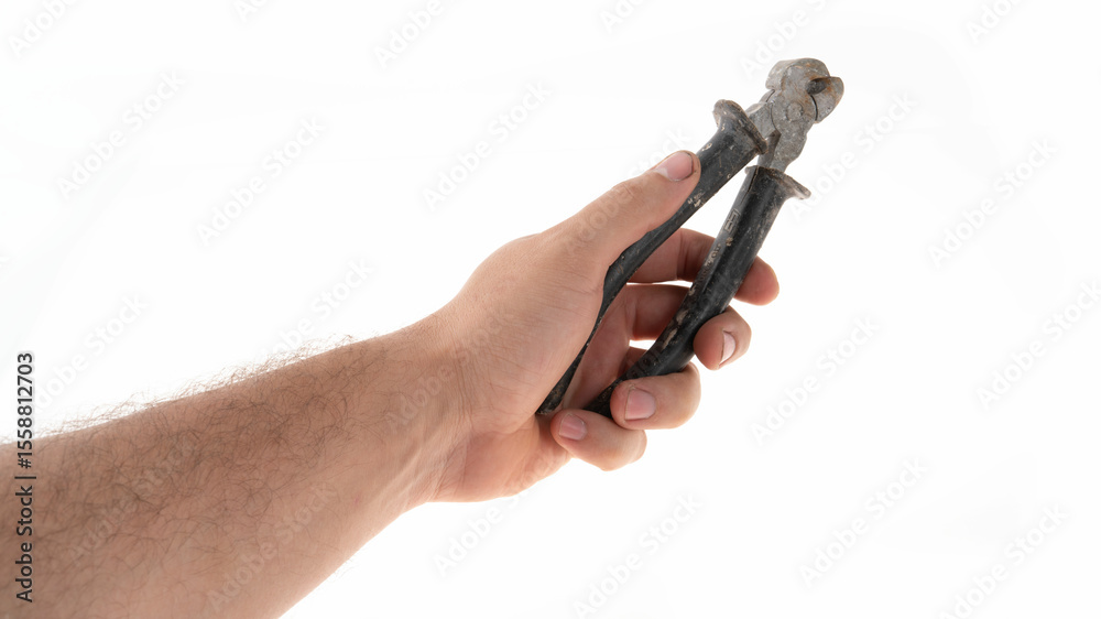 Naklejka premium Hand holds pliers against white background